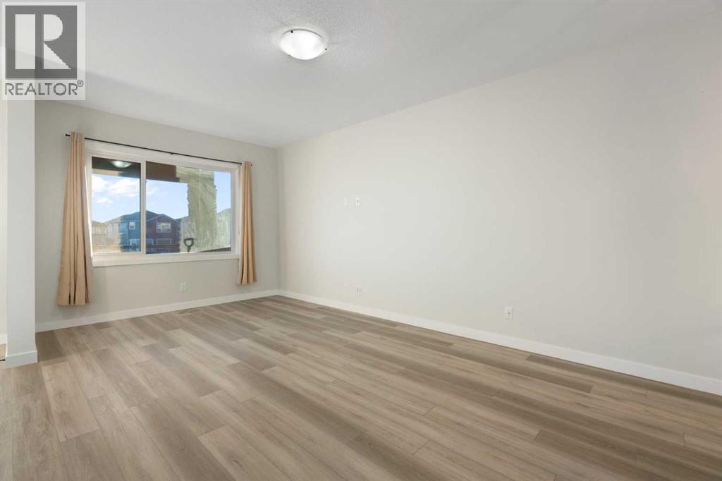 99 Edith Passage Nw, Calgary, Alberta  T3R 2B5 - Photo 8 - A2278688