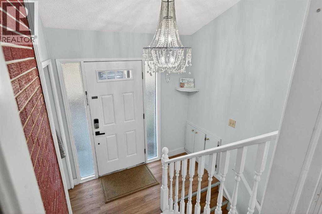 6003 Pinepoint Drive Ne, Calgary, Alberta  T1Y 2G2 - Photo 4 - A2287464