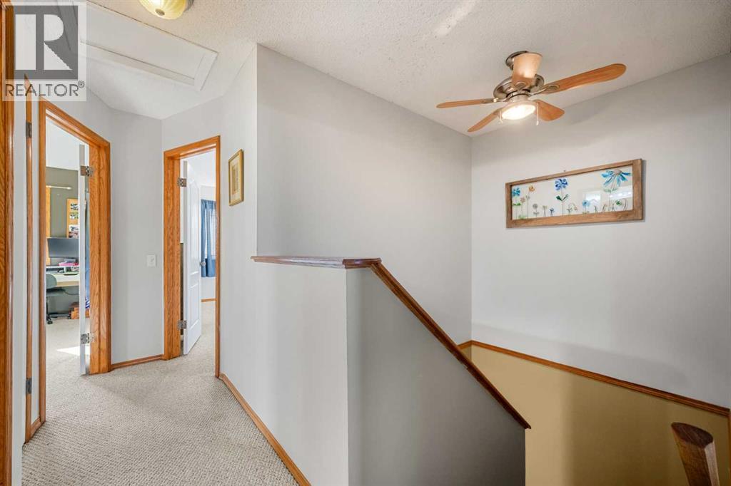 132 Bow Ridge Drive, Cochrane, Alberta  T4C 1V8 - Photo 10 - A2282061