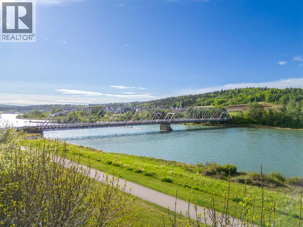 132 Bow Ridge Drive, Cochrane, Alberta  T4C 1V8 - Photo 34 - A2282061