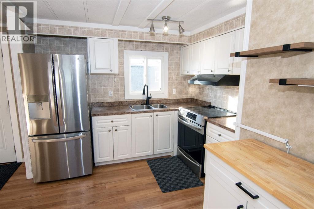 215 Polar Avenue Ne, High River, Alberta  T1V 1J4 - Photo 6 - A2283396