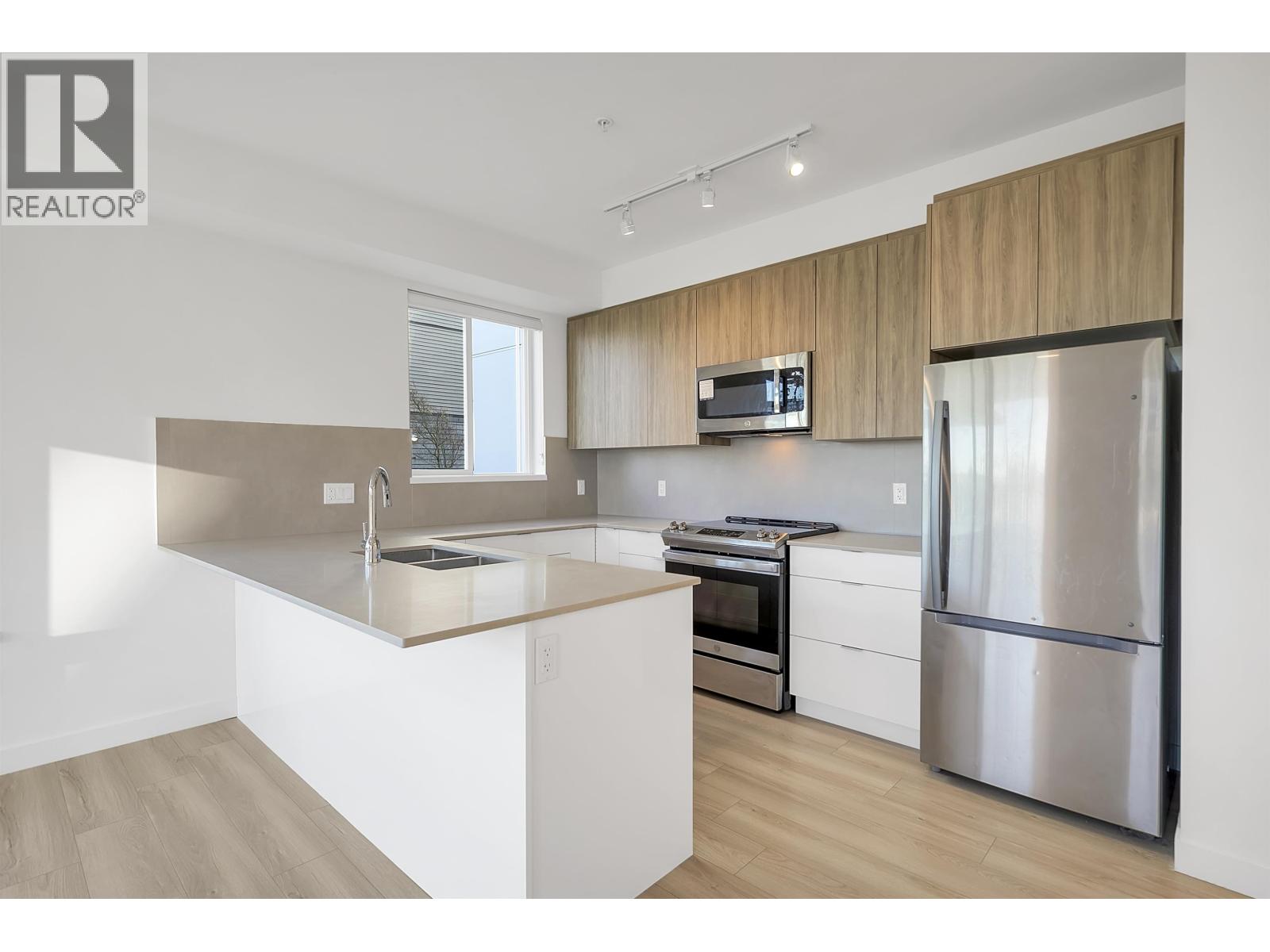 104 11913 Burnett Street, Maple Ridge, British Columbia  V2X 4N1 - Photo 3 - R3093714