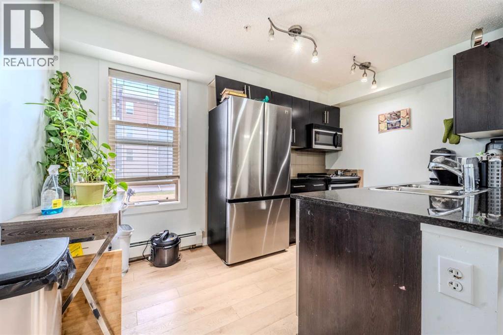 201, 7180 80 Avenue Ne, Calgary, Alberta  T3J 0N6 - Photo 10 - A2285776