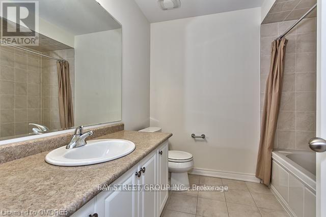 571 Sixteen Mile Drive, Oakville, Ontario  L6M 0P8 - Photo 15 - W12821292