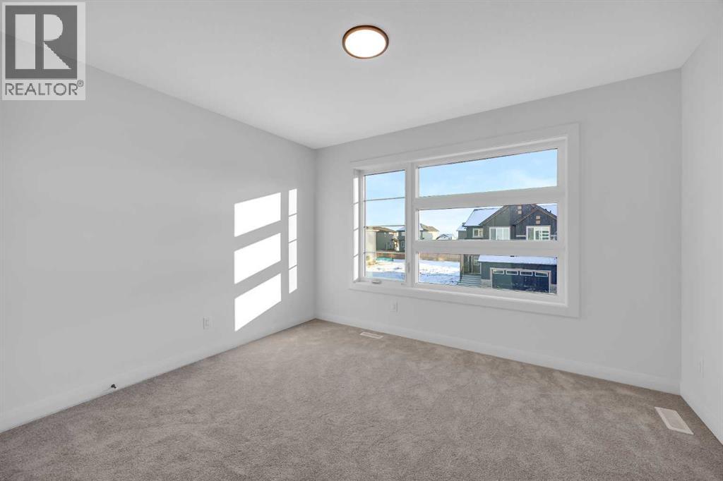 142 Northern Lights Crescent, Langdon, Alberta  T0J 1X2 - Photo 31 - A2288844