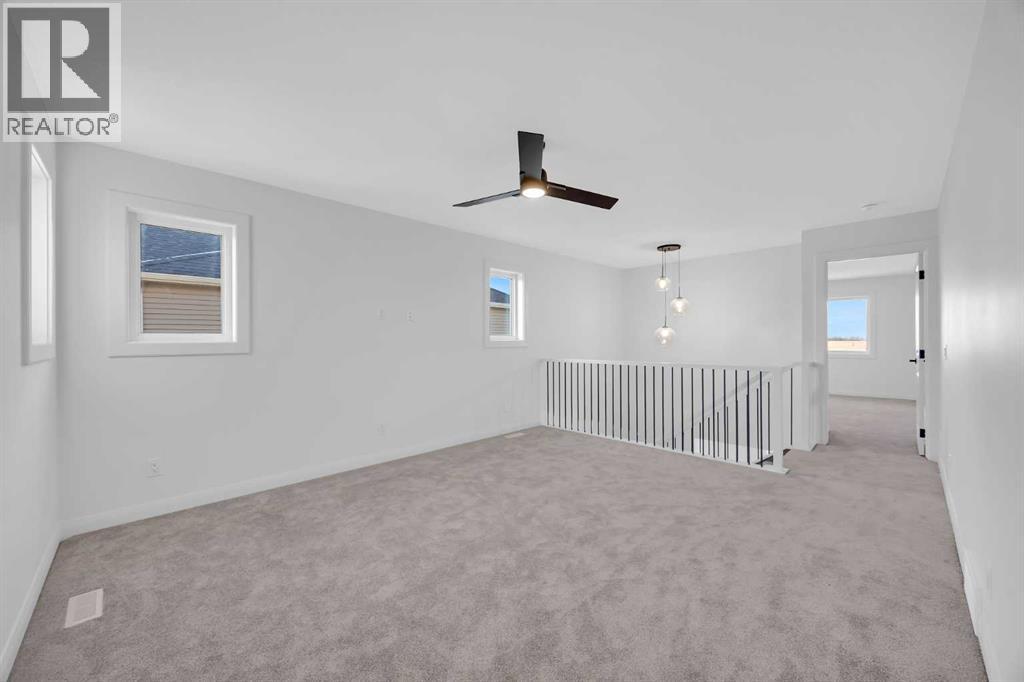 142 Northern Lights Crescent, Langdon, Alberta  T0J 1X2 - Photo 22 - A2288844