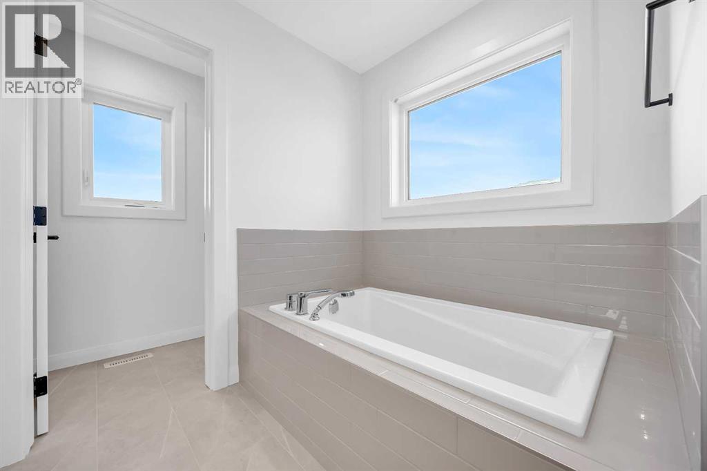 142 Northern Lights Crescent, Langdon, Alberta  T0J 1X2 - Photo 28 - A2288844