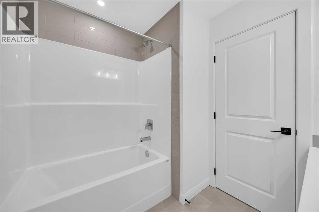 142 Northern Lights Crescent, Langdon, Alberta  T0J 1X2 - Photo 34 - A2288844