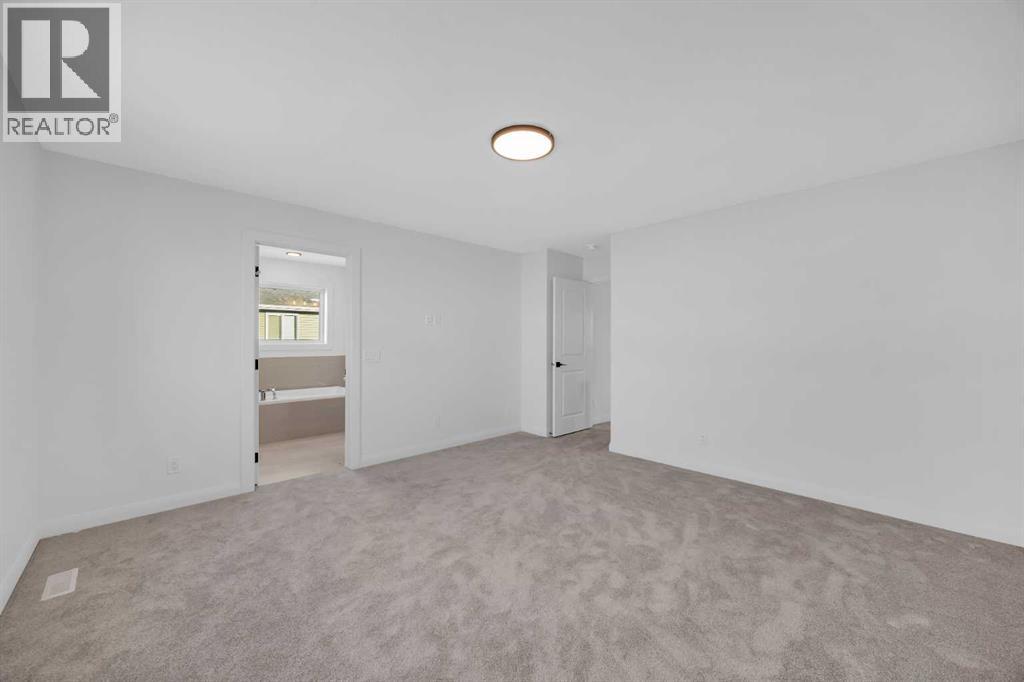 142 Northern Lights Crescent, Langdon, Alberta  T0J 1X2 - Photo 24 - A2288844