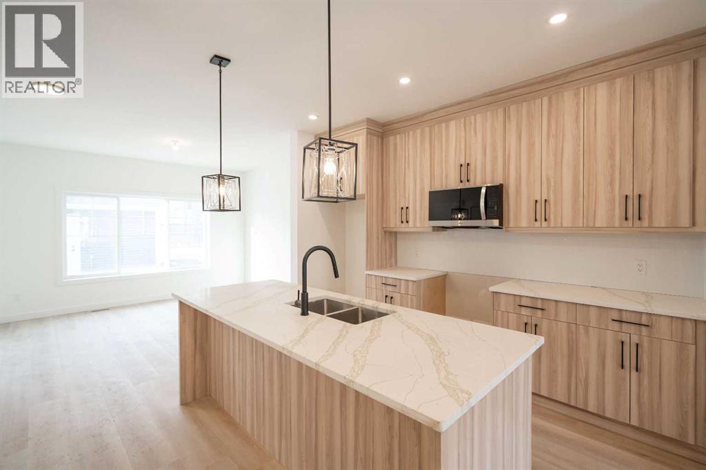 94 Baysprings Terrace Sw, Airdrie, Alberta  T4B 4A8 - Photo 4 - A2284625