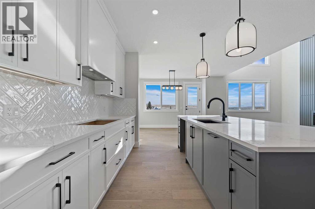 68 Heritage Ridge, Cochrane, Alberta  T4C 2J8 - Photo 9 - A2273193