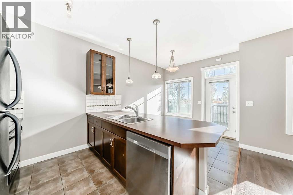 33 Cimarron Vista Gardens, Okotoks, Alberta T1S 0G2 - Photo 4 - A2263043