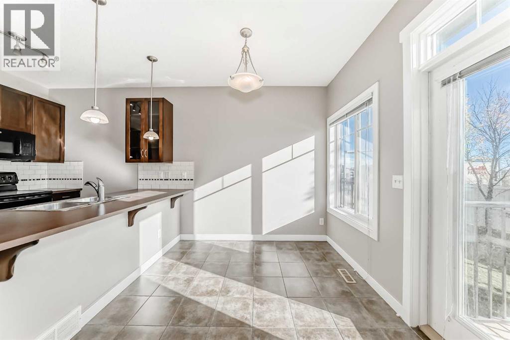 33 Cimarron Vista Gardens, Okotoks, Alberta T1S 0G2 - Photo 7 - A2263043