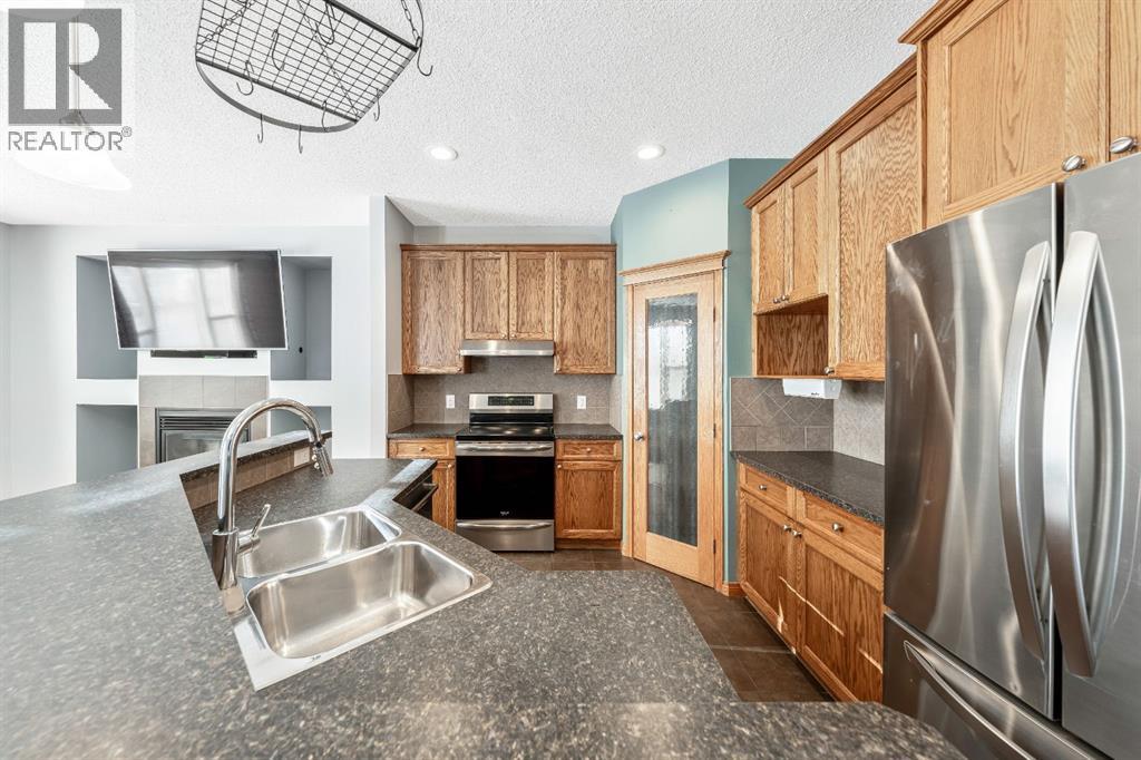 63 Besse Avenue Nw, Langdon, Alberta  T0J 1X2 - Photo 10 - A2277641