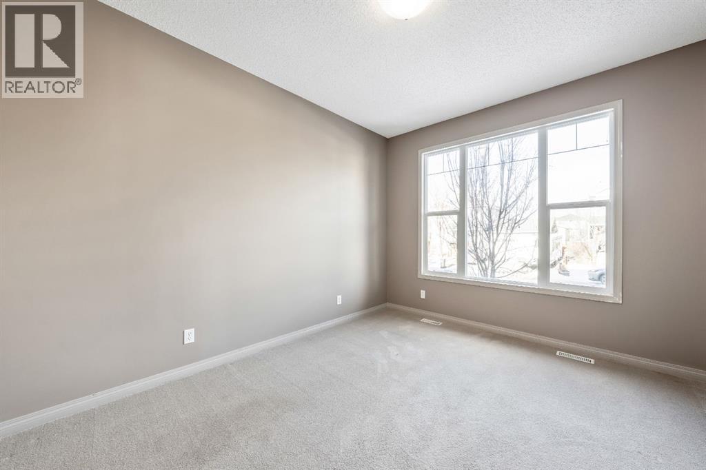 63 Besse Avenue Nw, Langdon, Alberta  T0J 1X2 - Photo 4 - A2277641