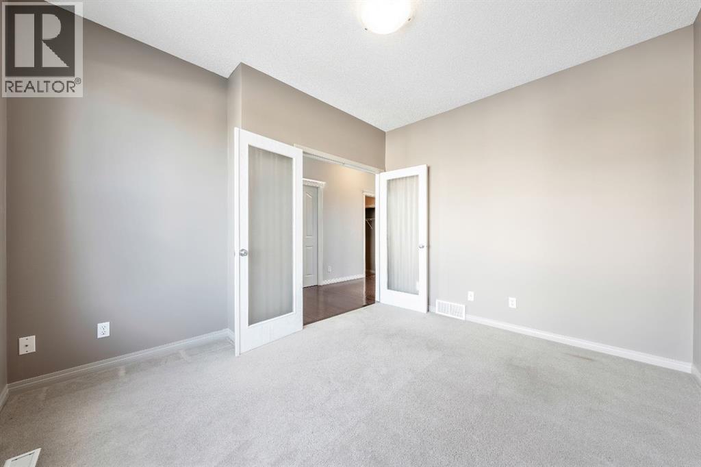 63 Besse Avenue Nw, Langdon, Alberta  T0J 1X2 - Photo 3 - A2277641