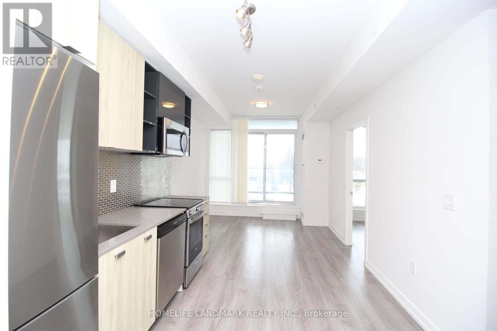 310 - 10 De Boers Drive, Toronto, Ontario  M3J 0L6 - Photo 5 - W12821666