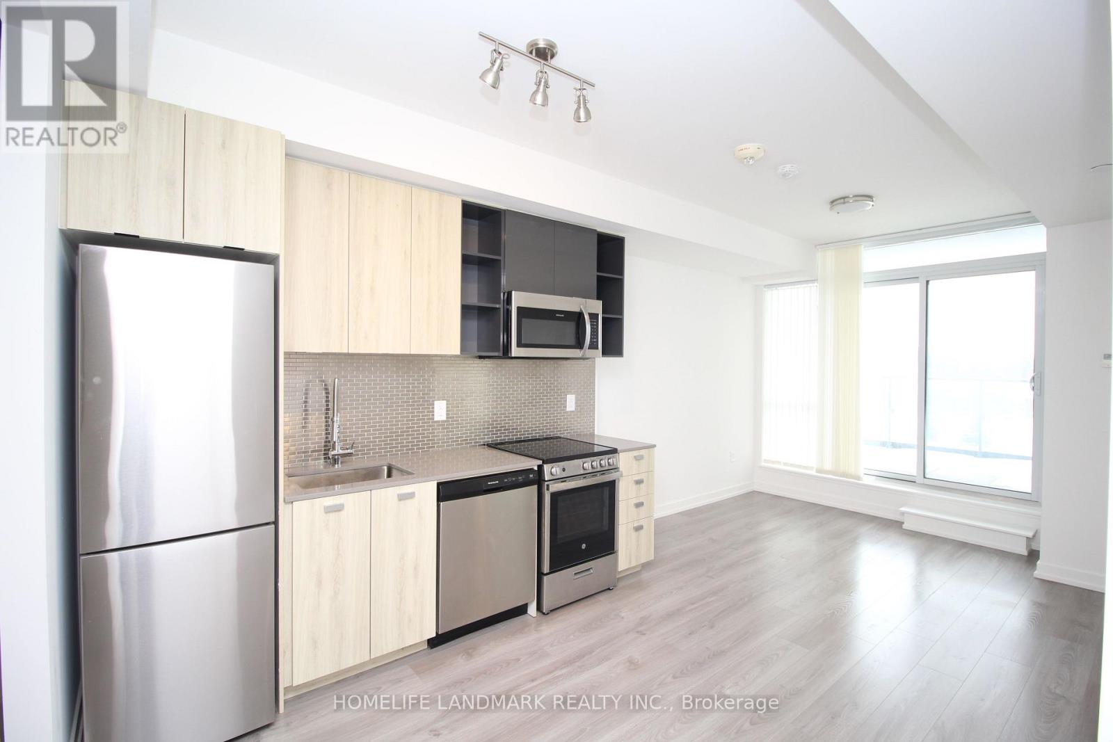 310 - 10 De Boers Drive, Toronto, Ontario  M3J 0L6 - Photo 6 - W12821666