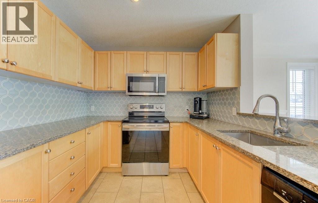 404 Wake Robin Crescent, Kitchener, Ontario  N2E 3L6 - Photo 4 - 40804886