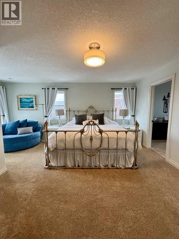 609 Sunrise Close Sw, Diamond Valley, Alberta  T0L 2A0 - Photo 25 - A2283906