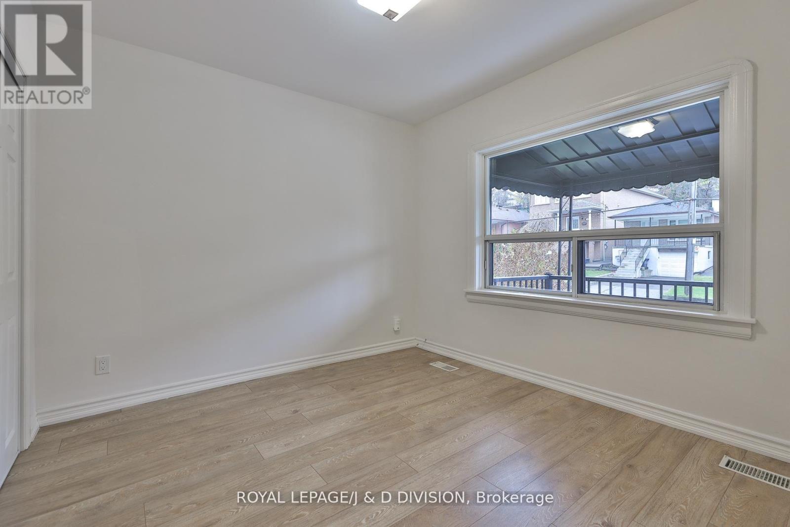 22 Holmesdale Road, Toronto, Ontario  M6E 1Y1 - Photo 10 - W12821972