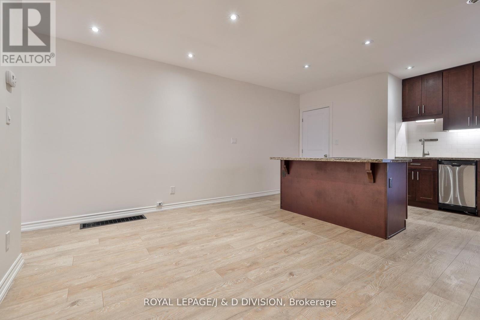 22 Holmesdale Road, Toronto, Ontario  M6E 1Y1 - Photo 6 - W12821972