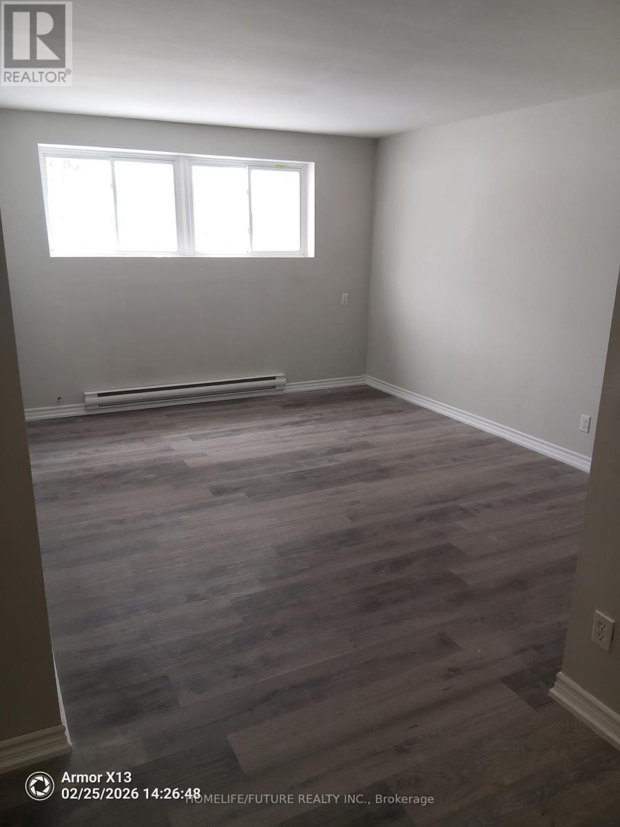 110 - 260 Academy Street, Loyalist, Ontario  K0K 1G0 - Photo 4 - X12817430