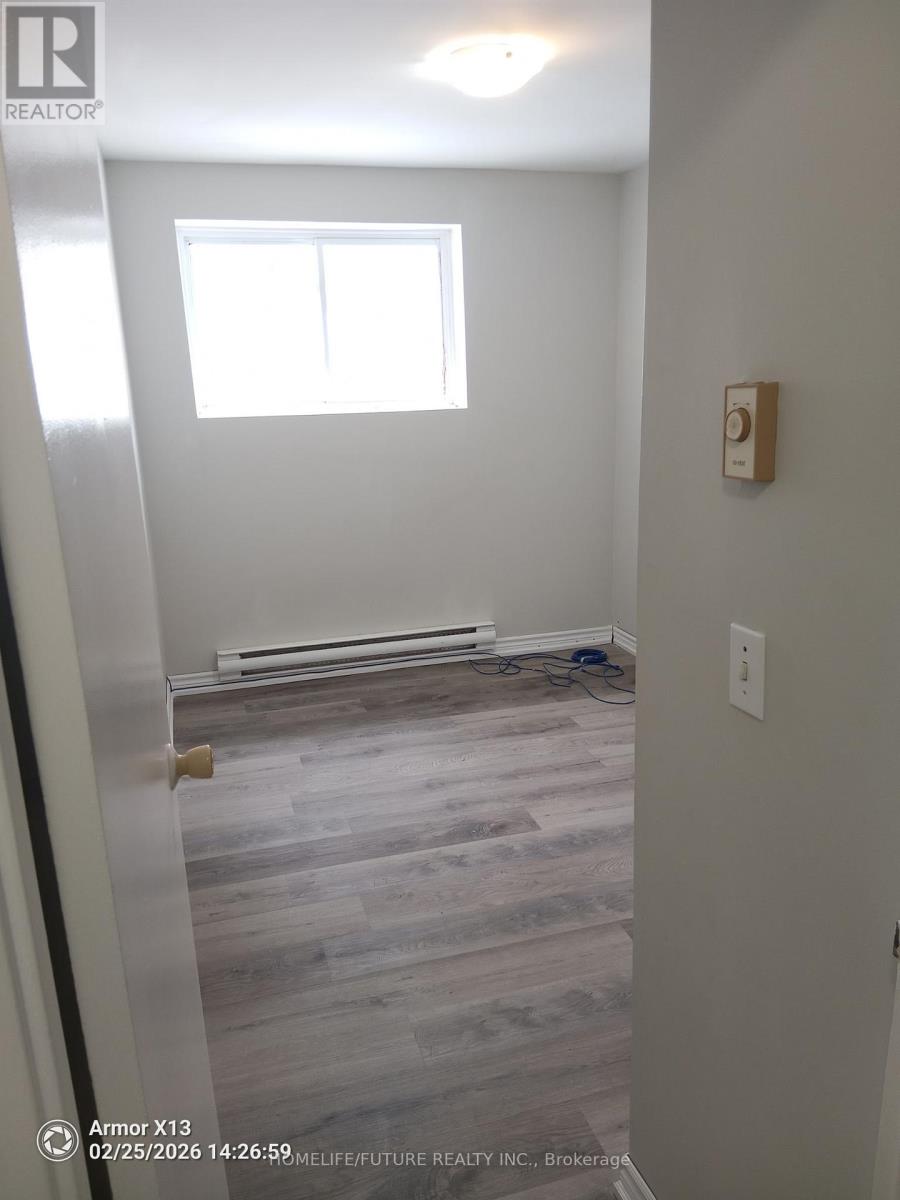 110 - 260 Academy Street, Loyalist, Ontario  K0K 1G0 - Photo 5 - X12817430