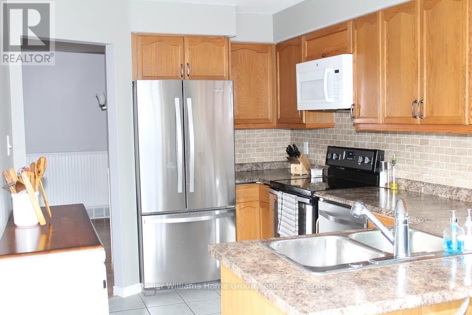 218 Silurian Drive, Guelph, Ontario  N1E 7B9 - Photo 4 - X12822438