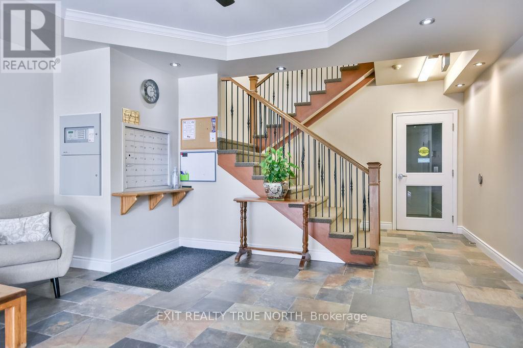 107 - 19b Yonge Street N, Springwater, Ontario  L0L 1P0 - Photo 2 - S12822388