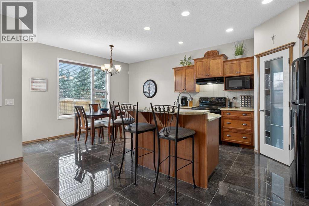 57 Pantego Hill Nw, Calgary, Alberta  T3K 0B7 - Photo 7 - A2284912