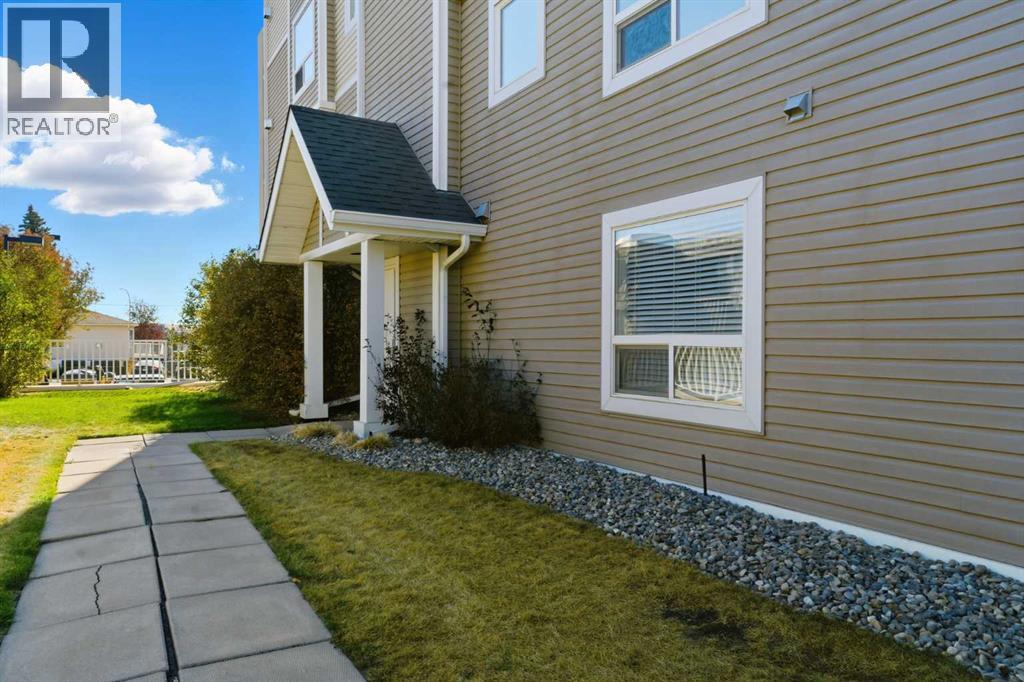 103, 128 Centre Avenue, Cochrane, Alberta T4C 2K5 - Photo 31 - A2266383