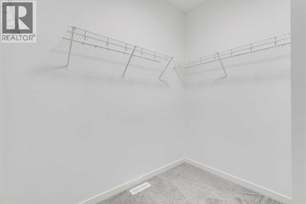 75 Fireside Common, Cochrane, Alberta  T4C 3E1 - Photo 29 - A2271464