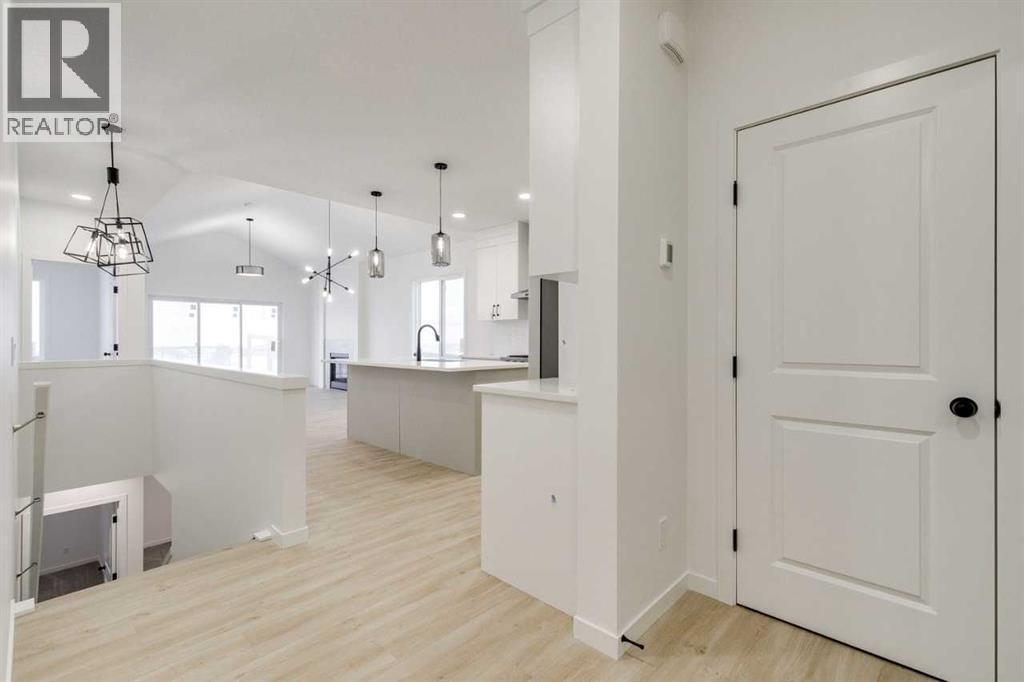 75 Fireside Common, Cochrane, Alberta  T4C 3E1 - Photo 6 - A2271464