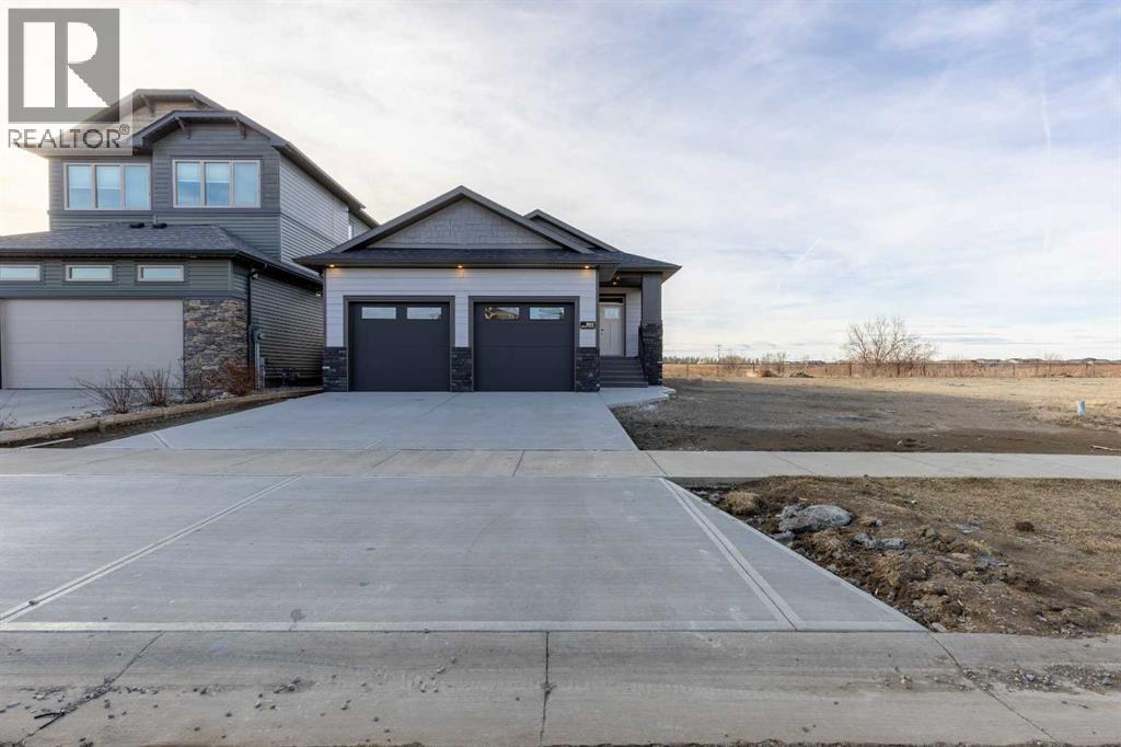 322 Canyon Meadows Road W, Lethbridge, Alberta  T1K 8E7 - Photo 2 - A2277428