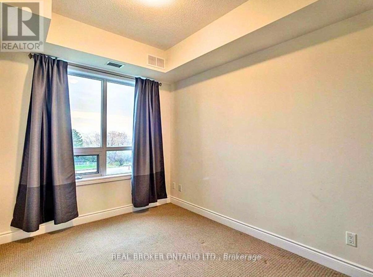 333 - 3170 Erin Mills Parkway, Mississauga, Ontario  L5L 0B6 - Photo 9 - W12823460