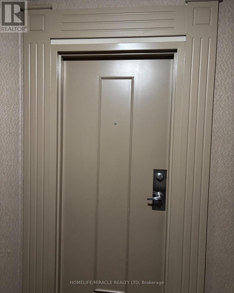 711 - 135 Hillcrest Avenue, Mississauga, Ontario  L5B 4B1 - Photo 3 - W12823474