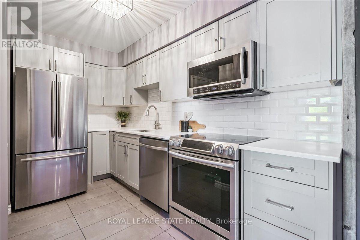 7 - 912 Rymal Road E, Hamilton, Ontario  L8W 3N4 - Photo 4 - X12823840