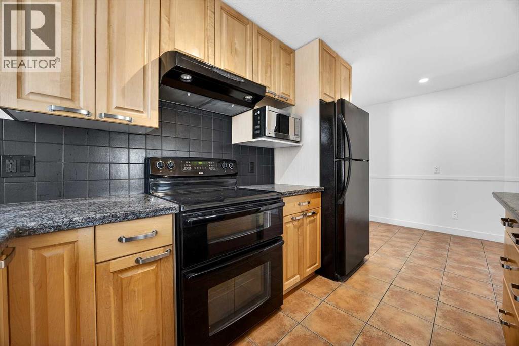 128 Bermuda Drive Nw, Calgary, Alberta  T3K 1H8 - Photo 11 - A2286966