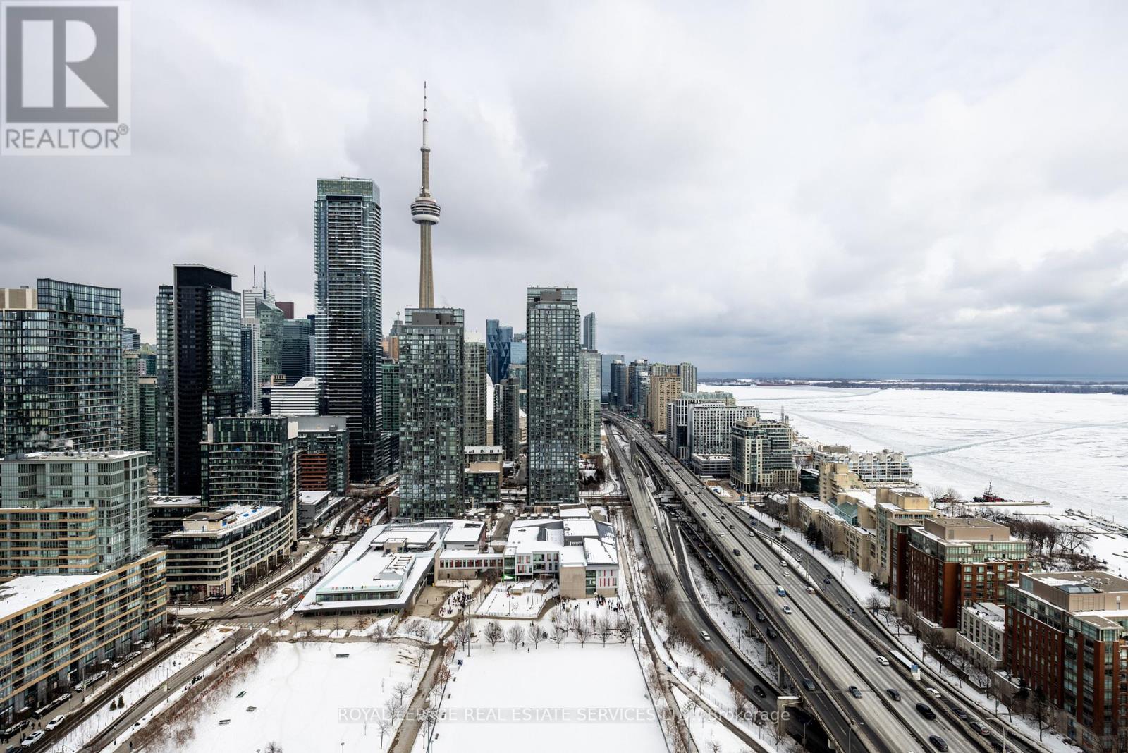 Spectacular southeast-facing, unobstructed views of the park, lake, and city skyline define this light-filled, airy 1+1-bedroom condo with parking. Enjoy breathtaking lake views from a spacious open-concept layout designed for both comfortable everyday living and effortless entertaining. The main living areas feature soaring 8'11" ceilings, enhancing the sense of space and natural light. The generous primary bedroom overlooks the park, CN Tower/skyline, and the water, while the versatile den is ideal for a home office or guest space. A sleek, modern kitchen features stainless steel appliances, quartz countertops, and space for an eat-in area that flows seamlessly into a well-proportioned living room with a Juliet balcony. A welcoming foyer with a large closet provides practical storage. Ideally located steps to the TTC, Harbourfront, Toronto Waterfront, parks, shops, restaurants, and bars, with quick access to the Gardiner Expressway, Rogers Centre, and Billy Bishop Airport-offering truly unbeatable convenience. Residents enjoy exceptional amenities, including a 24-hour concierge, visitor parking, game and theatre rooms, a party room with a kitchen, guest suites, a full-sized gym with fitness, weight, and cardio areas, a yoga studio, an indoor pool with a sauna, a pet spa, and an outdoor rooftop deck with BBQ's! (id:48254)