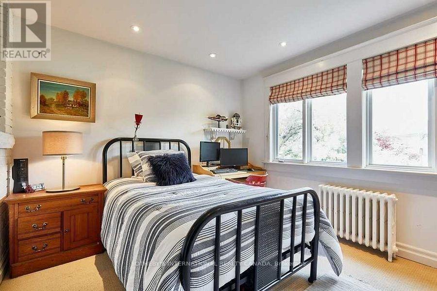 71 Gilmour Avenue, Toronto, Ontario M6P 3A8 - Photo 16 - W12824034