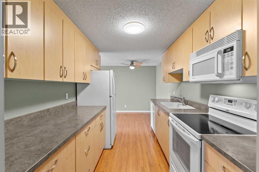 207, 280 Banister Drive, Okotoks, Alberta  T1S 1Y5 - Photo 4 - A2278025