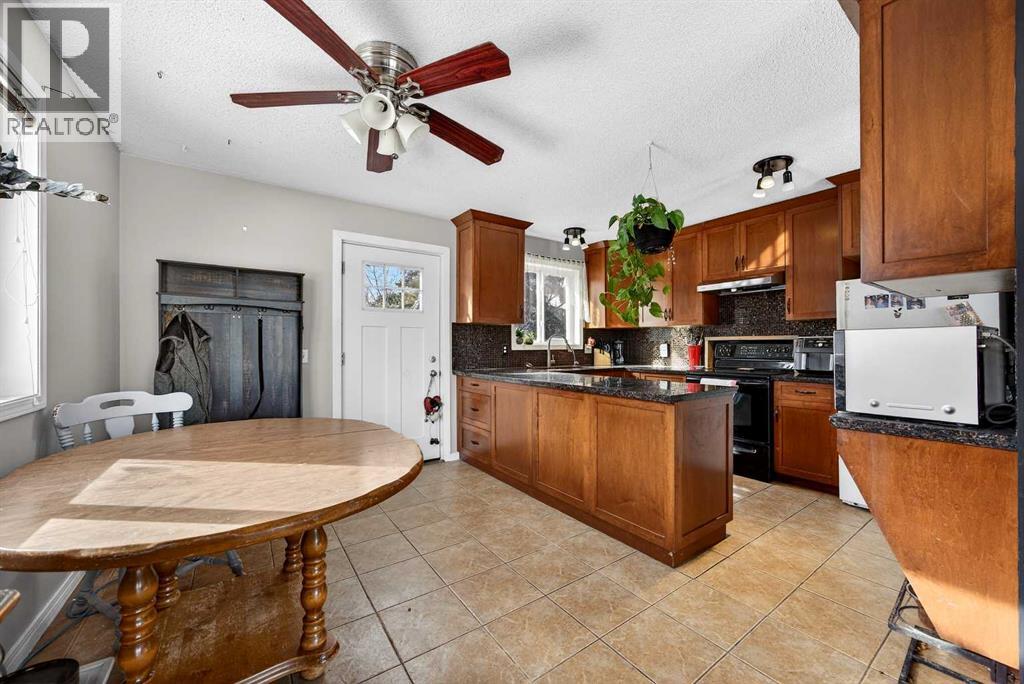 712 Madison Drive, Irricana, Alberta  T0M 1B0 - Photo 12 - A2282286