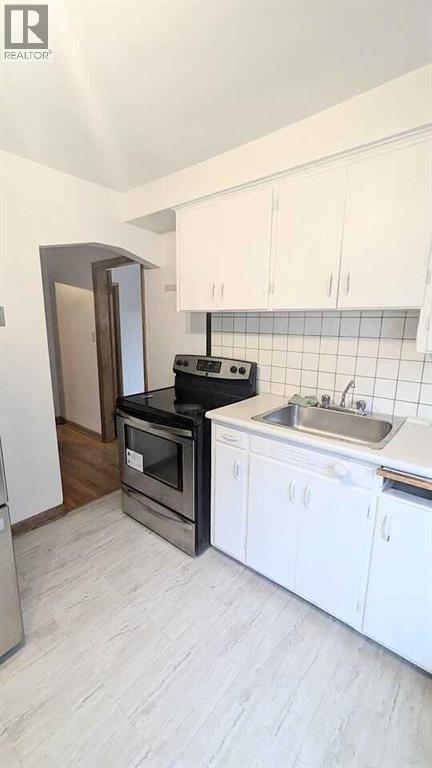 1436 22 Avenue Nw, Calgary, Alberta  T2M 1P8 - Photo 10 - A2282549