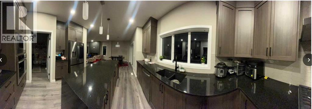 200 Lucas Gardens Nw, Calgary, Alberta  T3P 2R8 - Photo 3 - A2288998