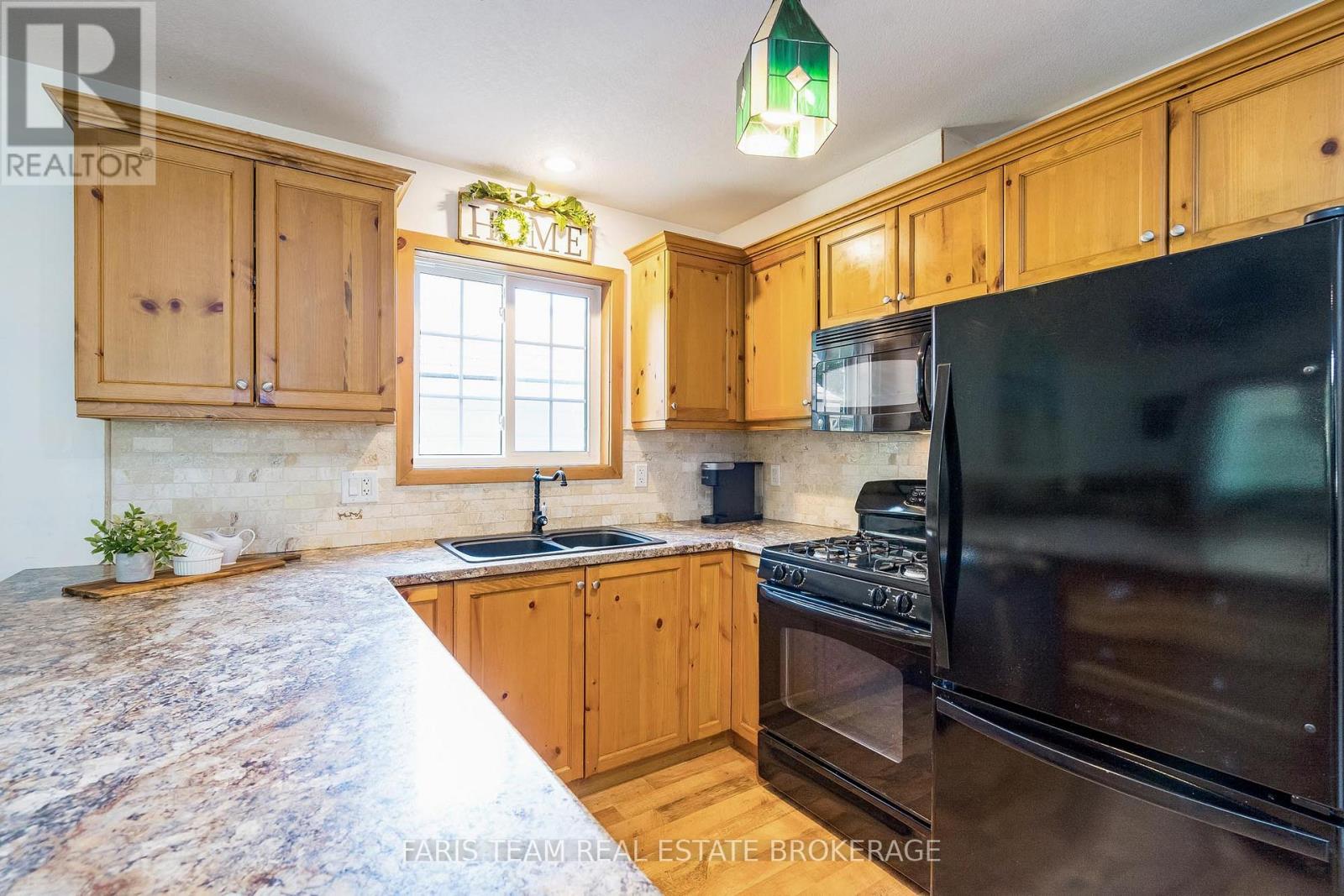 65 Madawaska Trail, Wasaga Beach, Ontario  L9Z 1X7 - Photo 5 - S12824184