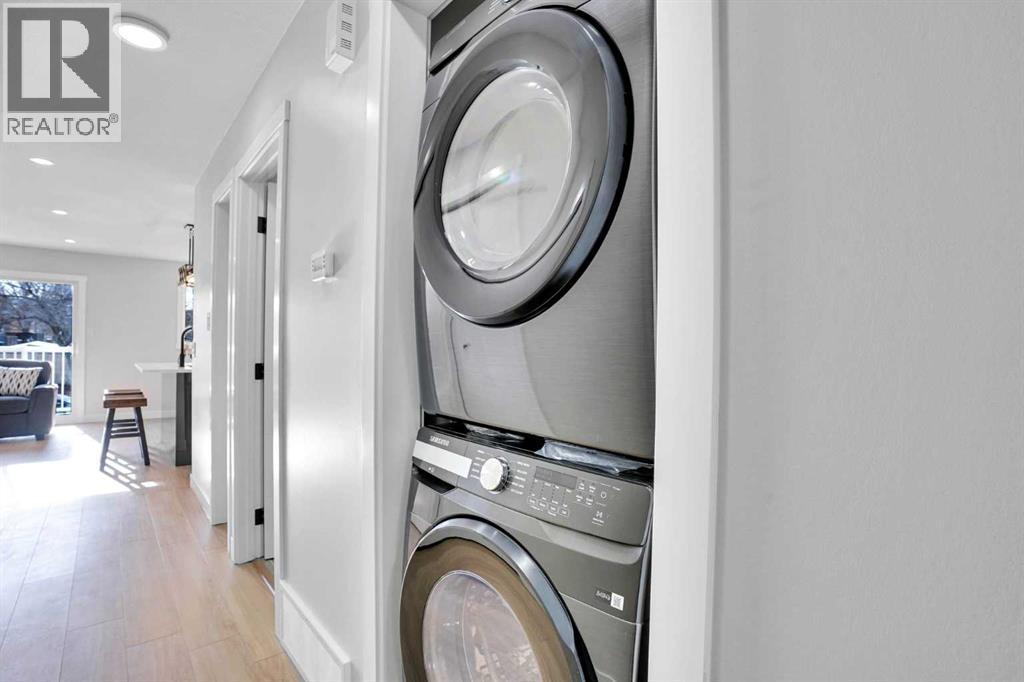 1306 Berkley Drive Nw, Calgary, Alberta  T3K 1S9 - Photo 12 - A2286533