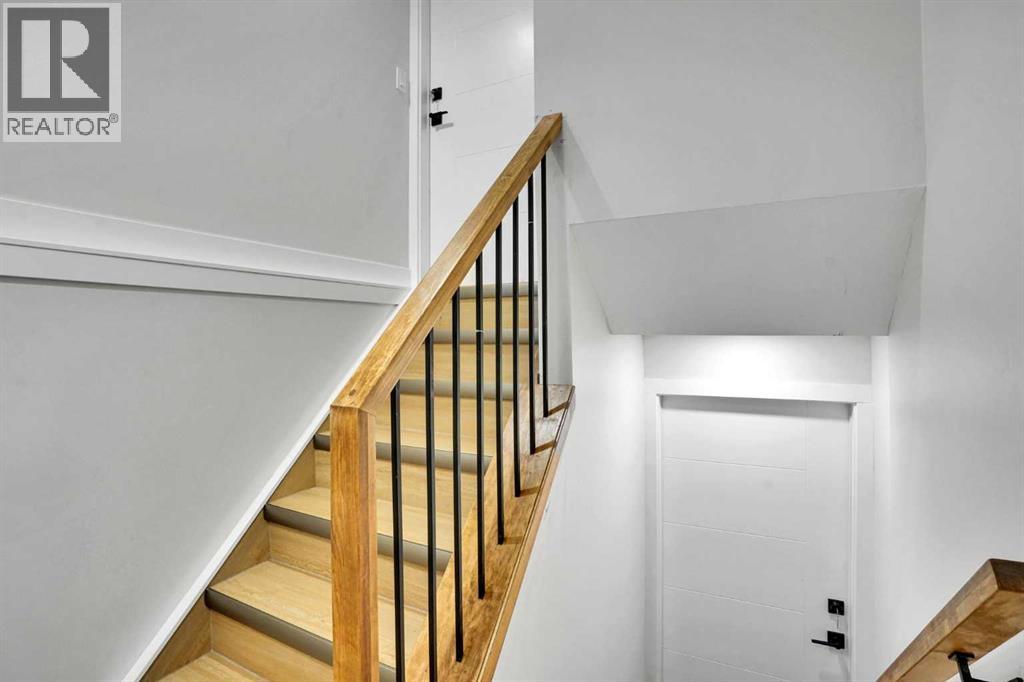 1306 Berkley Drive Nw, Calgary, Alberta  T3K 1S9 - Photo 31 - A2286533