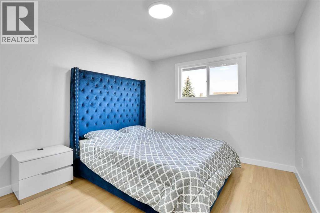 1306 Berkley Drive Nw, Calgary, Alberta  T3K 1S9 - Photo 14 - A2286533