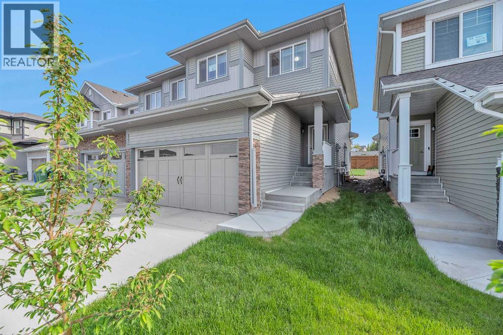 59 Belgian, Cochrane, Alberta  T4C 3C3 - Photo 2 - A2288035